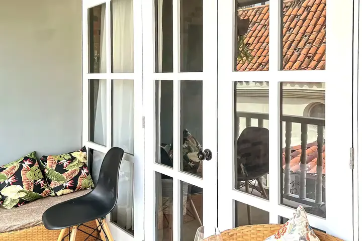 White glazed doors opening onto the balcony