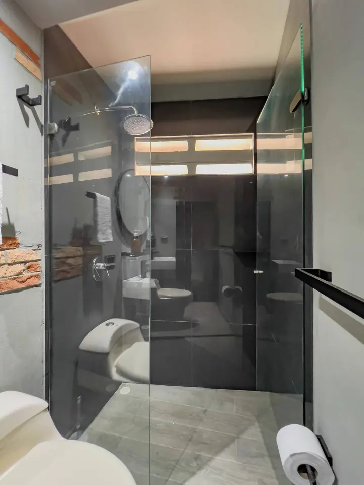 Bathroom with a glass shower screen