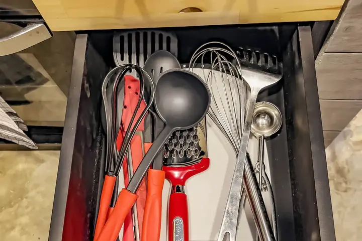 Drawer with cooking utensils