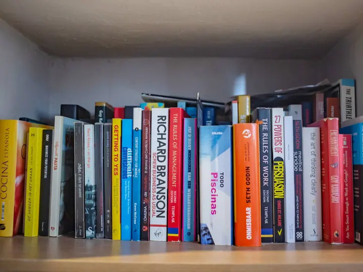 Shelf of books for guests