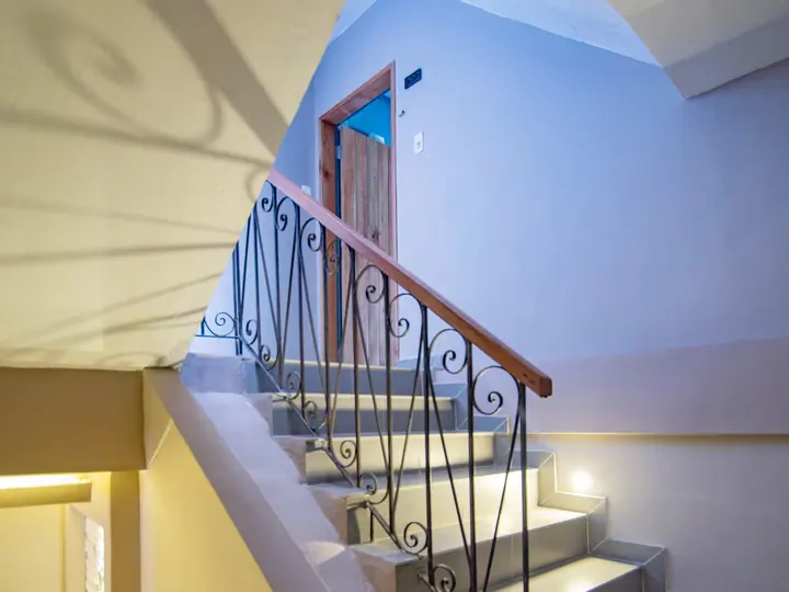 Staircase with wrought-iron railing