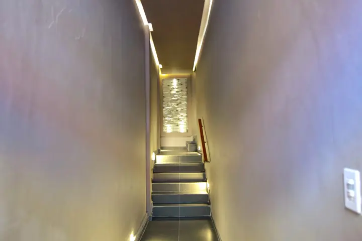 Lit corridor and stairs inside the building